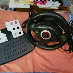 PELICAN STEERING WHEEL & GAS AND BRAKE PEDALS- SEE DESCRIPTION